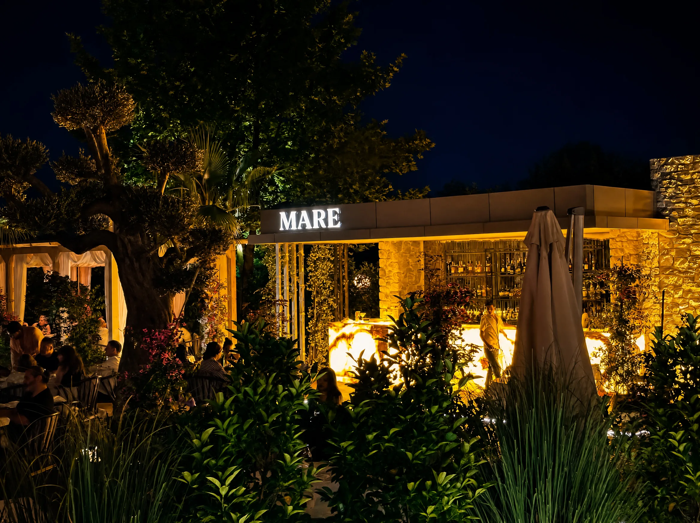 Evening lights in the garden — an outdoor restaurant in summer in Sapanca, Mare Gastro